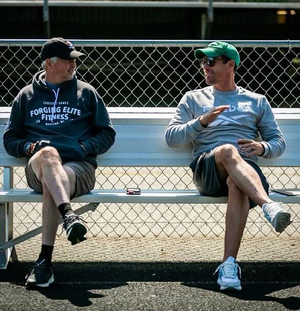 Chris Fox (left) and Adam Smith (right) left Syracuse to helm the inception of Reebok Boston Track Club. Now, Fox has returned to SU as an assistant coach.