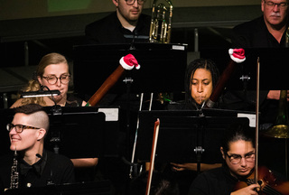 The Syracuse University orchestra joins the Hendricks Chapel Choir in playing a number of different holiday songs. Two of the musicians adorned their bassoons with little santa hats to get into the festive spirit. 