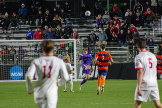 Russell Shealy clears the ball from the penalty area, kicking it down field towards the forwards. The net remained empty for much of the game due to Shealy’s saves. 