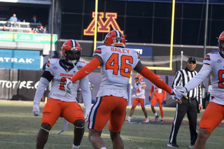 Linebackers freshman Kadin Bailey and sophomore Marlowe Wax Jr. celebrate a defensive play resulting in change of possession. The pair had a total of eight tackles for the game.