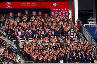 As part of the Spirit Squad, the Syracuse Marching Band attends the bowl game to cheer on the team. Both schools brought their marching bands, which meant one performed at halftime and the other during pre-game. 