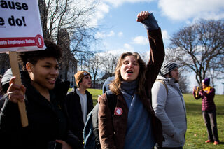 Freshman Omi Wolfe and her friends march with enthusiasm and passion. At previous events, SGEU representatives highlighted the importance of undergraduate support in the movement.