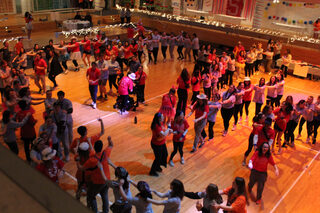 Students gather in Goldstein Auditorium to dance and raise money for pediatric cancer. The dance marathon lasted 12 hours, starting at 10 a.m., until the final fundraising total was revealed at 10 p.m.