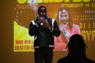 Sophomore Didier “DJ” Dumervil, the Black Student Union’s Parliamentarian, is the master of ceremonies for Caribfest. Throughout the night, Dumervil announced pageant contestants, introduced each section of the competition and interacted with the audience through games and giveaways.
