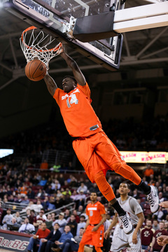 Freshman point guard Kaleb Joseph rises for a two-handed dunk. He went 7-for-7 from the field in the game, finishing with 14 points.