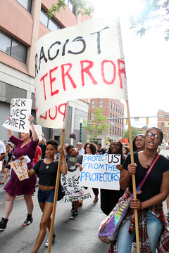 One sign held by a protester during the Black Lives Matter march reads: 