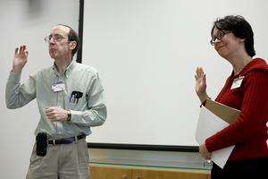 (From left) Nelson Pardee, a pastor and former ITS worker at Syracuse University, won a public speaking contest through the Orange Orators on Tuesday. Susan Watts, right, is the president of the Orange Orators. 