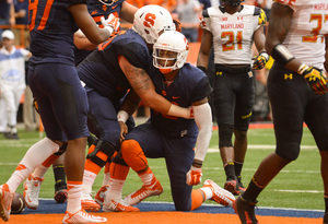 Terrel Hunt kneels in the end zone after running for a would-be touchdown that was called back for a penalty.