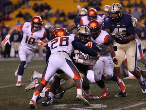 SU cornerback Antway Cordy wraps up a Pittsburgh ball-carrier during the Panthers' 30-7 thumping of SU on Saturday at Heinz Field.