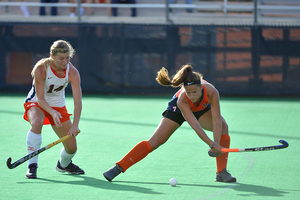 Midfielder Alma Fenne reaches for the ball during Syracuse's 3-1 win on Friday. The Orange defense stifled the Cavaliers in the battle of undefeated ACC sides.