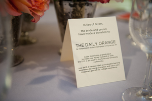 At Lesley Conroy and Brian Tahmosh's wedding, the two decided not to provide favors but rather made a donation to The D.O.