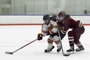 Syracuse staved off Robert Morris to clinch a first-round bye in the CHA tournament. 