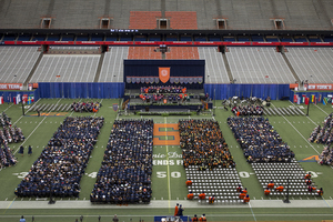 Students take their seats for the 2015 Commencement address.