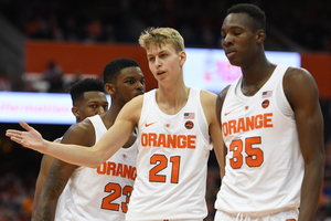 Bourama Sidibe (right) finished with seven points, six rebounds and two blocks in 19 minutes for SU.