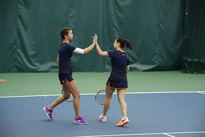 Masha Tritou, left, and Libi Mesh have been one of many doubles combinations employed by Syracuse so far this season.