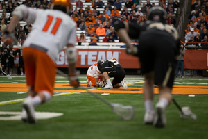 Danny Varello (center left) wasn't spectacular at the faceoff X, but won when it mattered for SU.