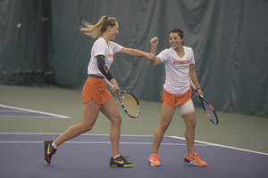 Gabriela Knutson and Miranda Ramirez usually play doubles together, but SU head coach Younes Limam prevents his players from living together.