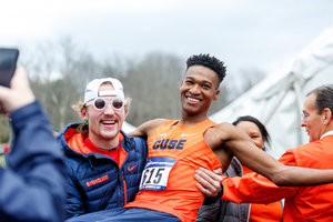 Justyn Knight, pictured after winning the NCAA cross country championship, finished second in his final collegiate race on Friday night.