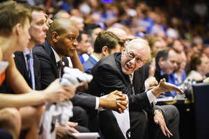 Syracuse head coach Jim Boeheim occasionally reacts to events with vigor on the SU bench.