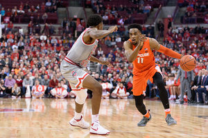 Oshae Brissett drives to the rim. He scored 14 in Syracuse's win.