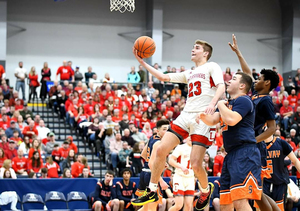 Aidan Macaulay and Lowville basketball narrowly lost to Joe Girard III and Glen Falls in a 2019 State Championship.