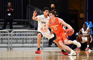 Joe Girard III dribbles past a San Diego State defender. Girard had 12 points against the Aztecs. 