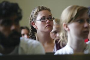 Lilly Thomann, a freshman education major, sits in Hendricks Chapel during a ceremony held to commemorate the 10th anniversary of Sept. 11.