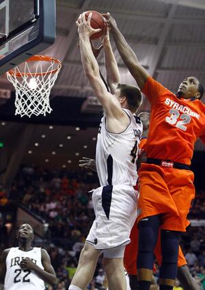 Notre Dame's Jack Cooley and Syracuse's Kris Joseph