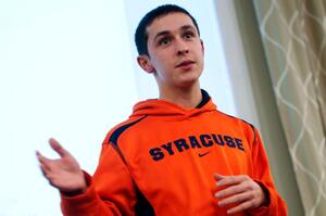 Stephen DeSalvo, Student Association comptroller, speaks to the general assembly Monday night about several new bills, many of which concerned special programming funds.