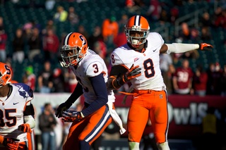 Syracuse cornerback Keon Lyn (8) celebrates with Durell Eskridge after Lyn returned an interception for a touchdown.