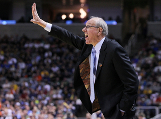 Head coach Jim Boeheim of the Syracuse Orange gestures from the sideline during the game against the California Golden Bears