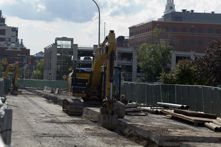 Work continues on Waverly Avenue, between University Avenue and Crouse Avenue, as construction crews continue to replace a 100-year-old brick sewer beneath the street. Photo taken July 5, 2017