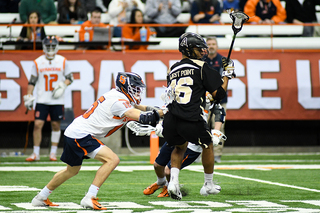 The Orange traps a Black Knights midfielder. 