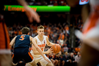 Buddy Boeheim tries to drive left on Guy, who covered him most of his time on the floor. Guy went 8-for-10 from deep in an explosion. 