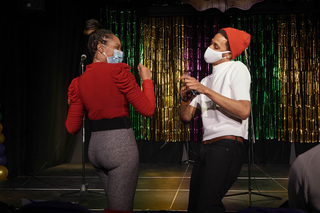 People take a dance break during the performance intermission.